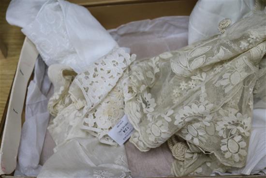 A 1920s lace wedding dress together with a collection of lace and white work and a lace bonnet